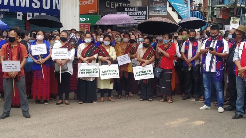 Citizens carry placards during a ‘Mass Citizen Rally’ against the state government’s move to relocate the Dimapur DC Office on October 5. (Morung Photo)